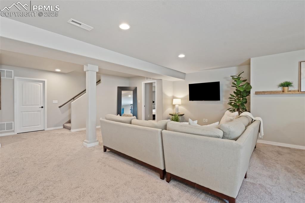 Image 17 of 28: Large Family Room in Basement