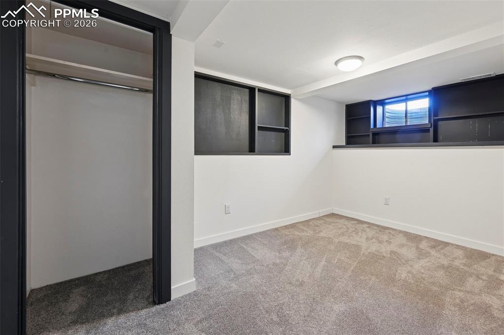 Image 23 of 28: Bedroom