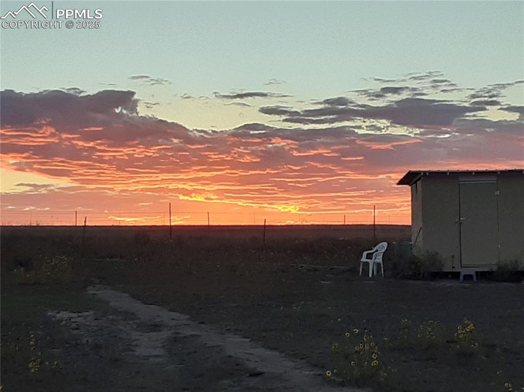 Image 15 of 29: View of mountain backdrop featuring rural landscape