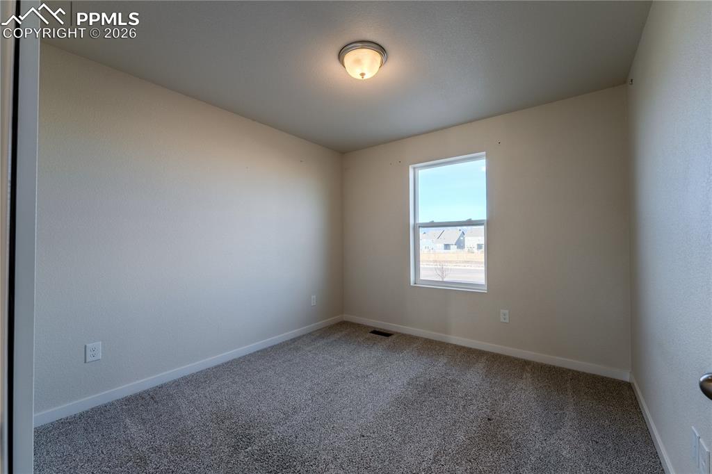 Image 13 of 24: Bedroom