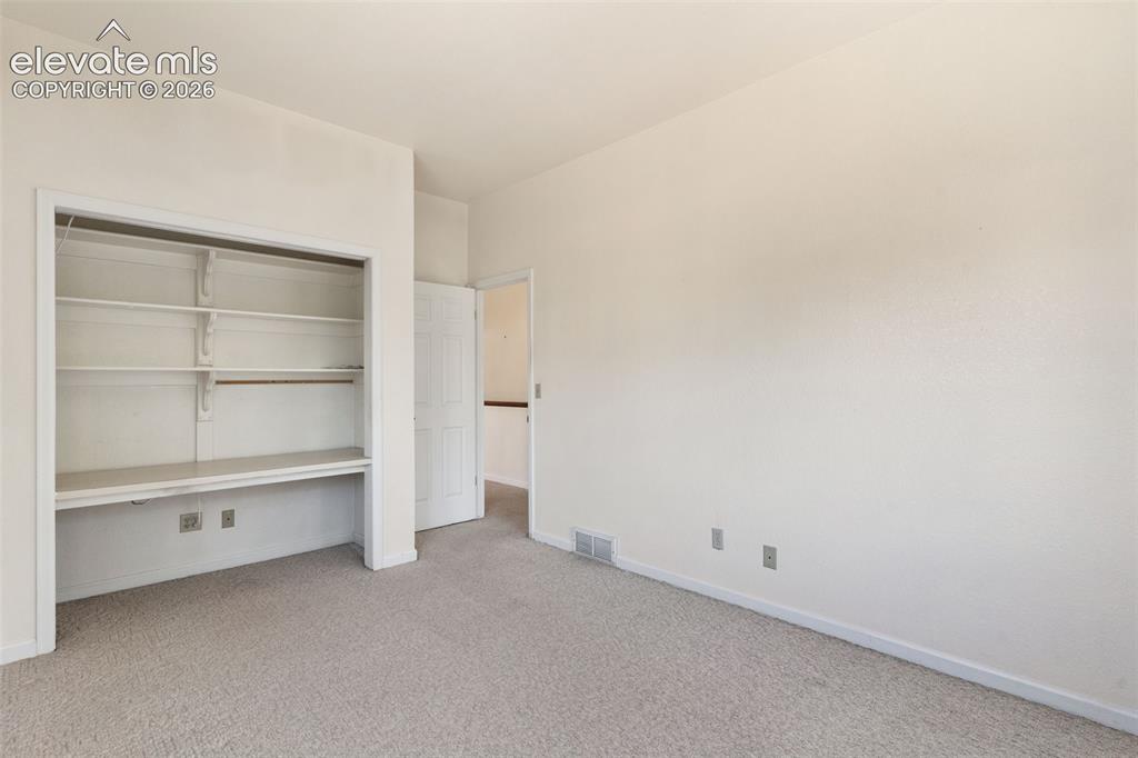 Image 18 of 33: Bedroom
