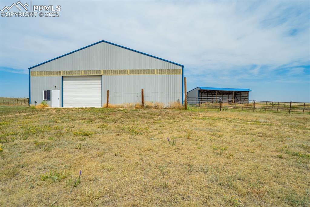 Image 43 of 50: View of pole building featuring a view of countryside