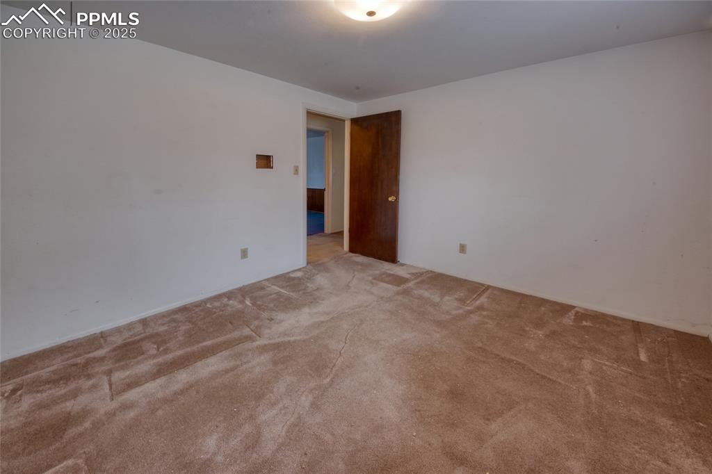Image 23 of 37: View of carpeted empty room