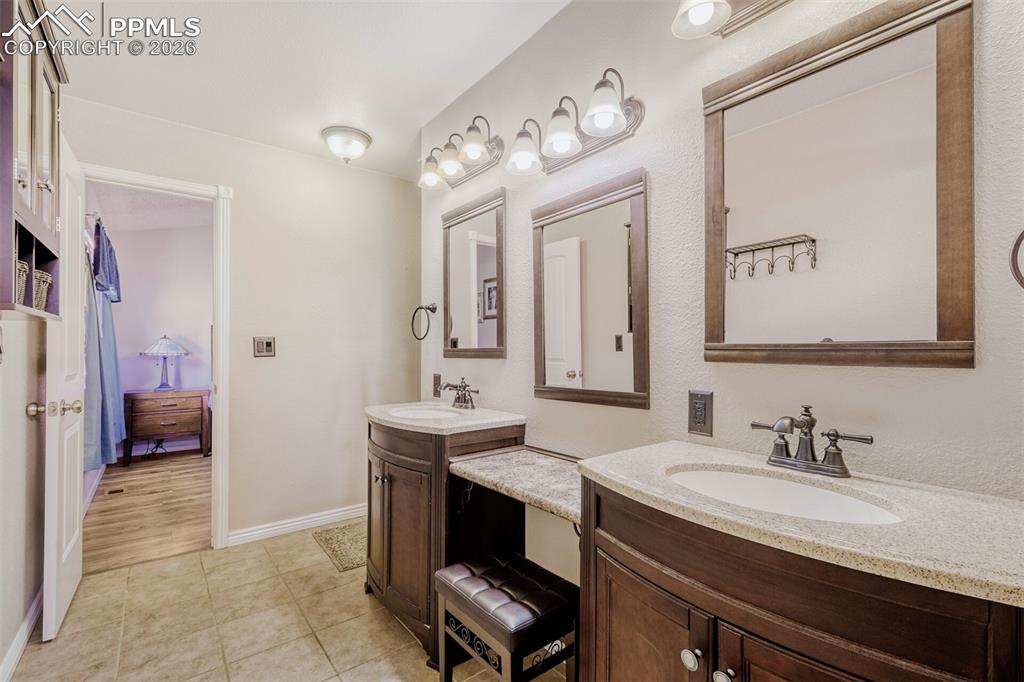 Image 12 of 31: Main Level Primary Bath with Double Vanity