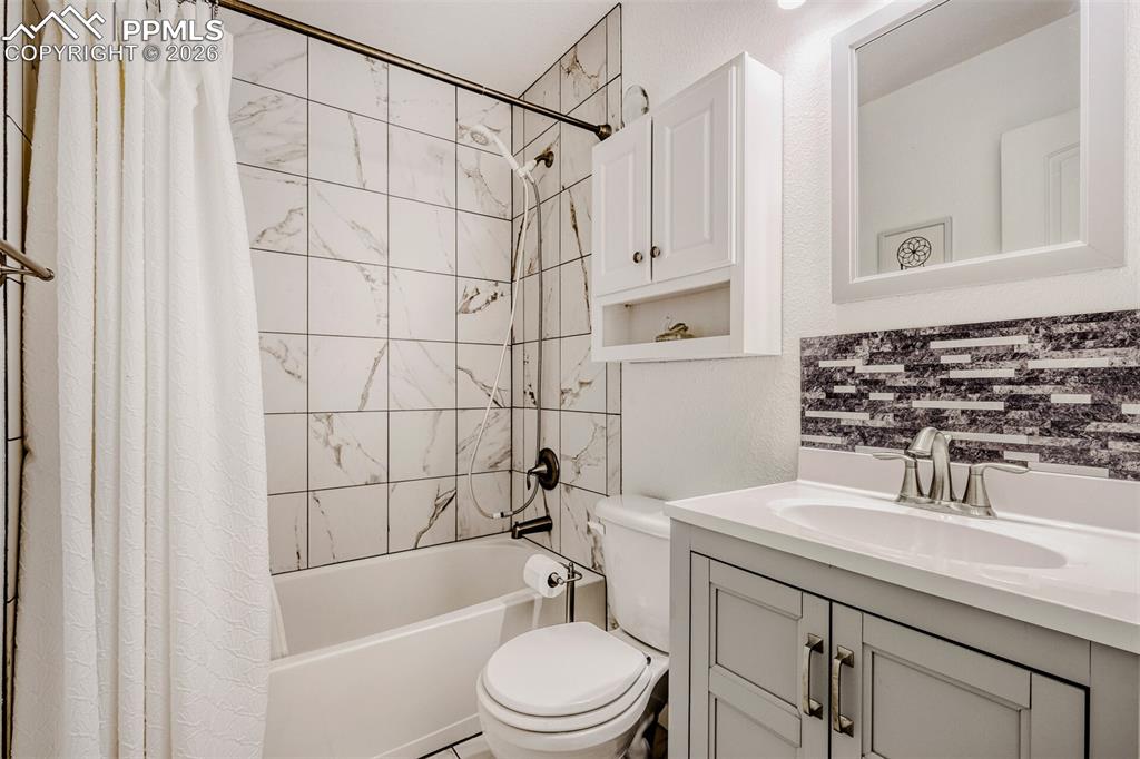 Image 14 of 31: Main Level Hallway bath