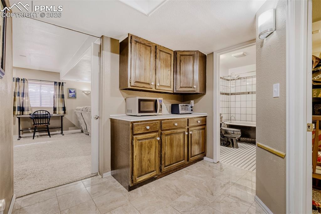 Image 20 of 31: Basement Dry Bar