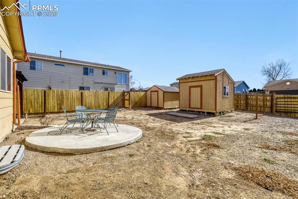 Image 27 of 31: Two storage sheds or work shops