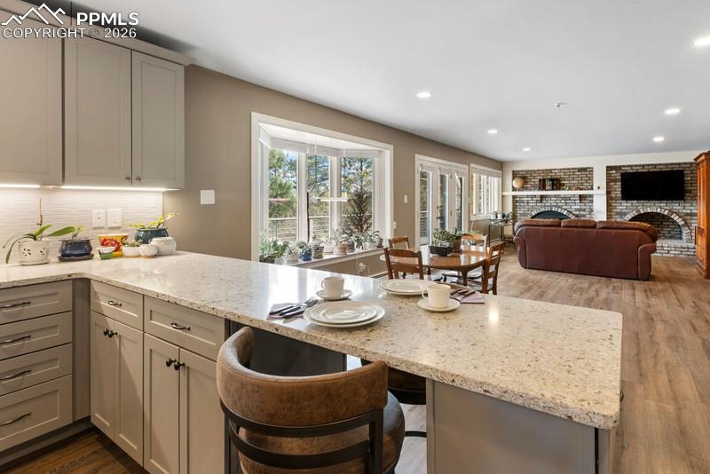 Image 10 of 47: Great room concept kitchen, nook and family room!