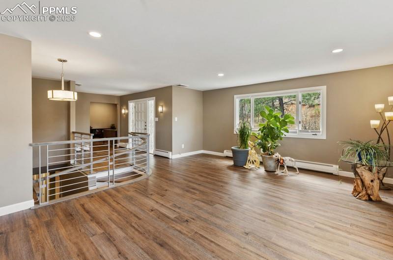 Image 16 of 47: Living room to entry