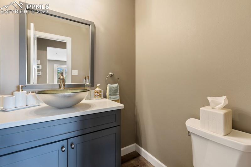 Image 26 of 47: 1/2 bath on the main