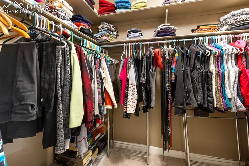 Image 37 of 47: Primary walk in closet