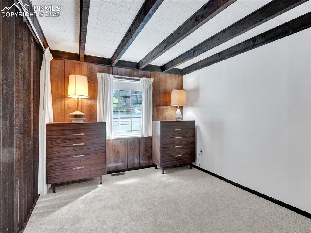 Image 10 of 43: Main level bedroom