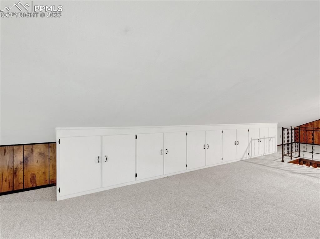 Image 18 of 43: what a wonderful space with tons of storage.