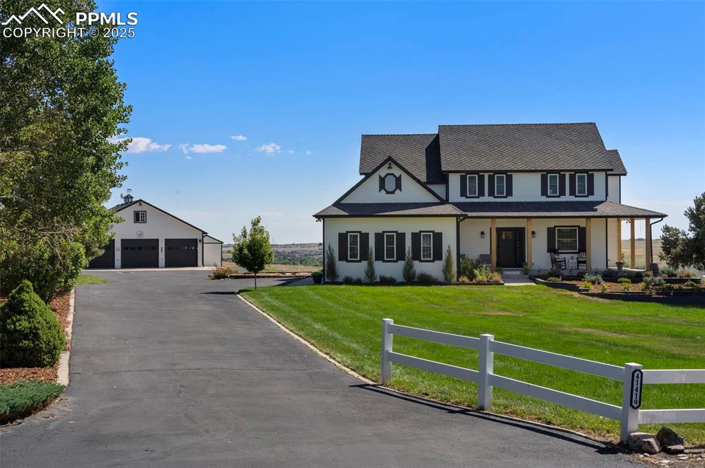 Caption: This gorgeous home sits on 1.56 acres that has been meticulously maintained.