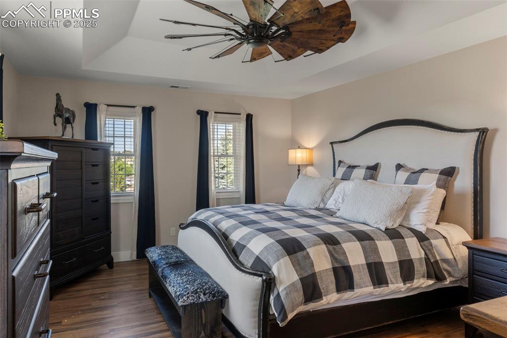 Image 20 of 50: Upstairs is the primary bedroom with huge walk in closet and ensuite bath. 