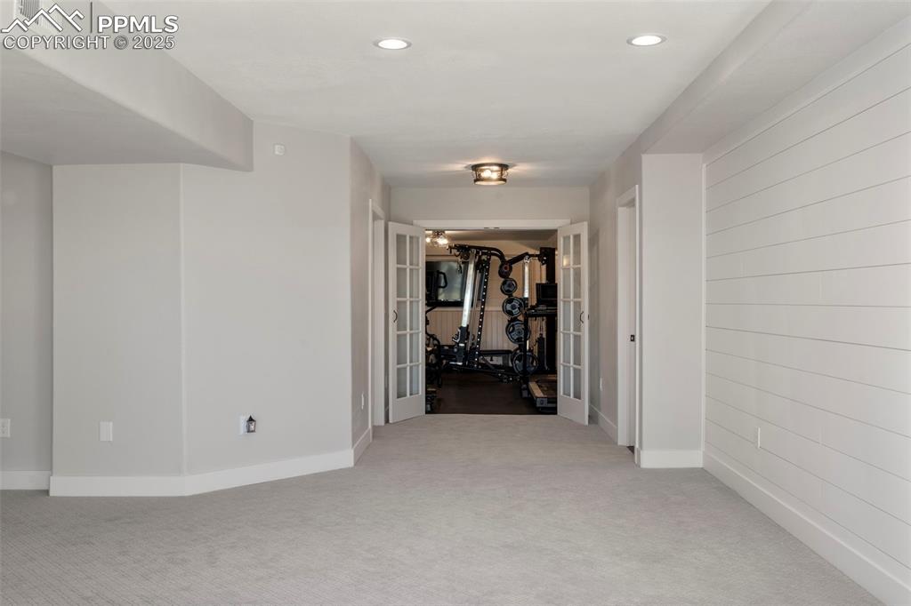 Image 33 of 50: Basement family room, rec room... the possibilities are endless. 