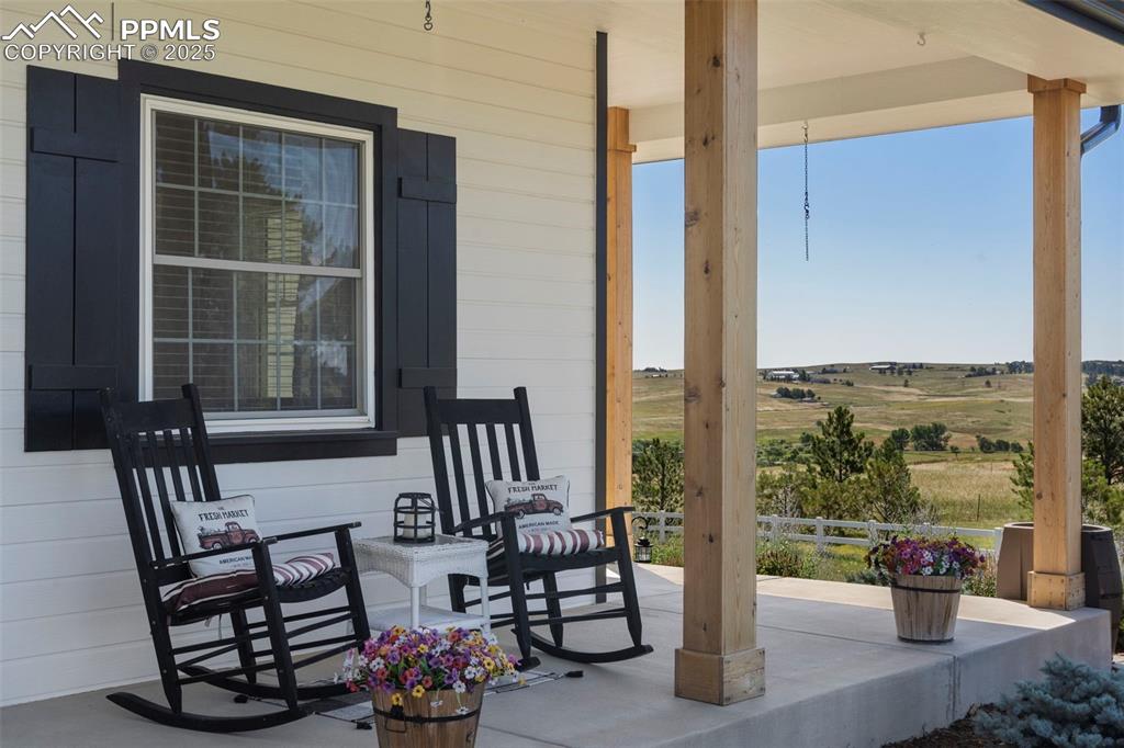 Image 4 of 50: The perfect place for your morning coffee or to catch the mountain views. 