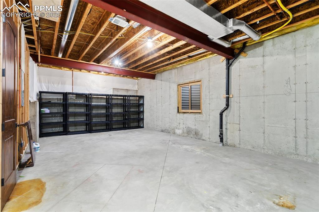 Image 47 of 50: Store all of your extras and holiday decorations in this gigantic basement