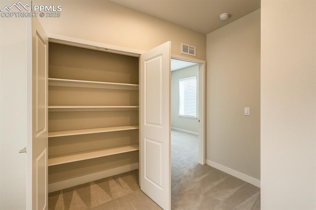 Image 27 of 50: Closet