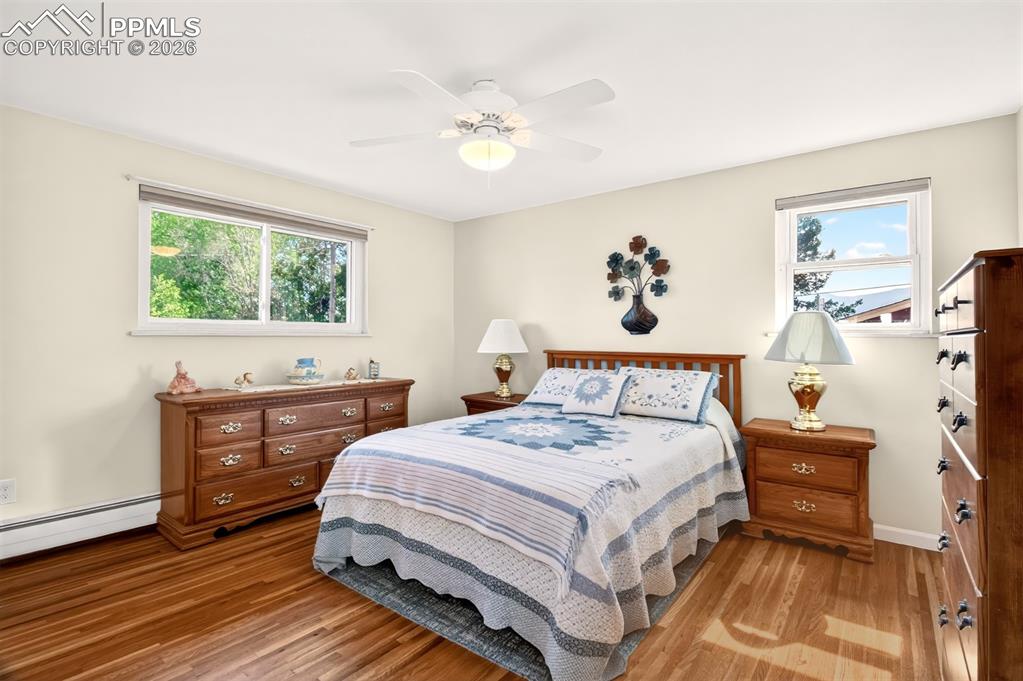 Image 13 of 39: Primary Bedroom, Pikes Peak Views From The Side Window