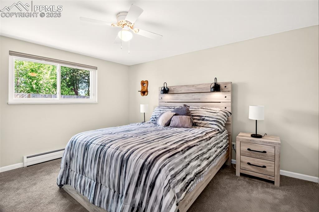 Image 27 of 39: Basement Guest Bedroom