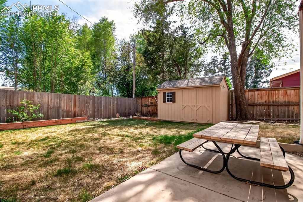Image 32 of 39: Storage Shed, Private Yard and Patio