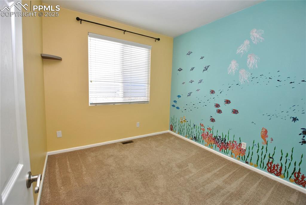 Image 21 of 27: Bedroom