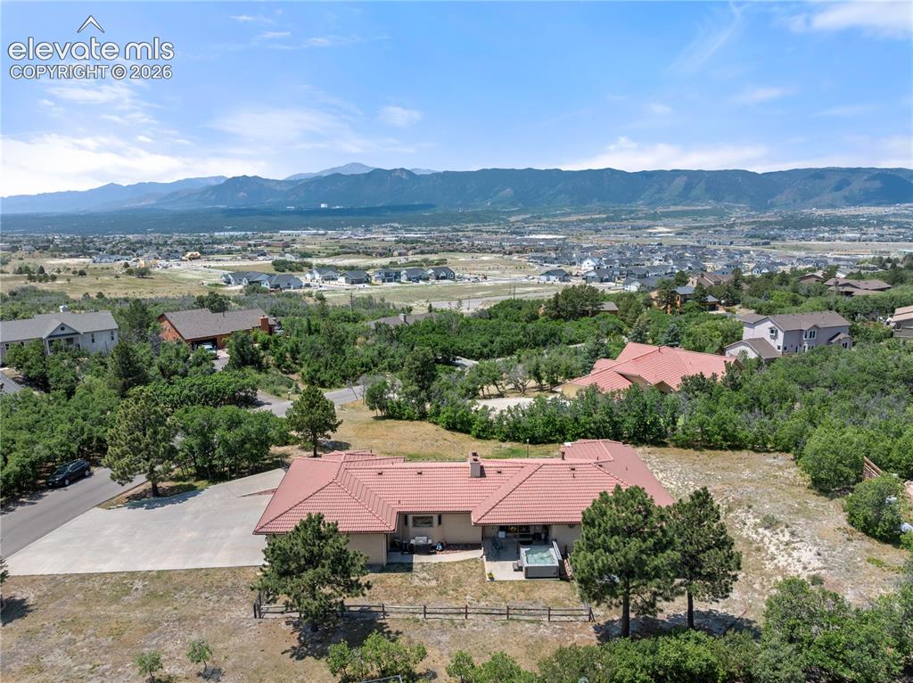 Image 1 of 30: Private backyard retreat perfectly positioned to capture breathtaking Front