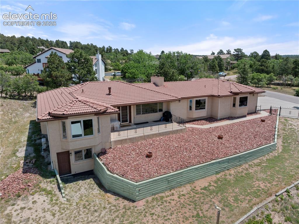 Image 2 of 30: Sweeping aerial view showcasing the home