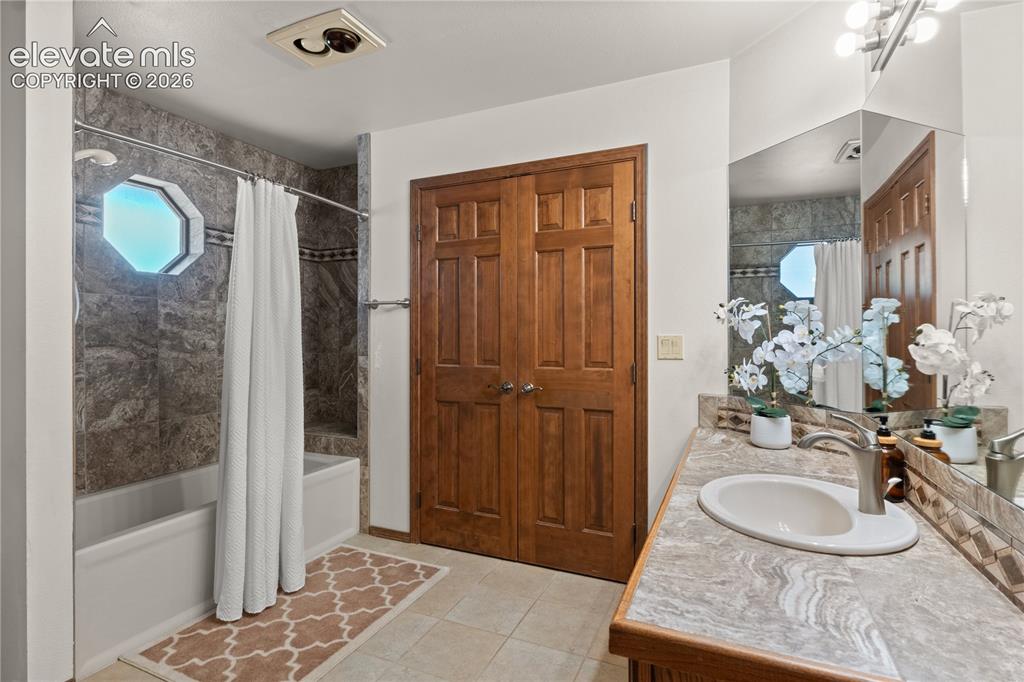 Image 22 of 30: Main level full bathroom