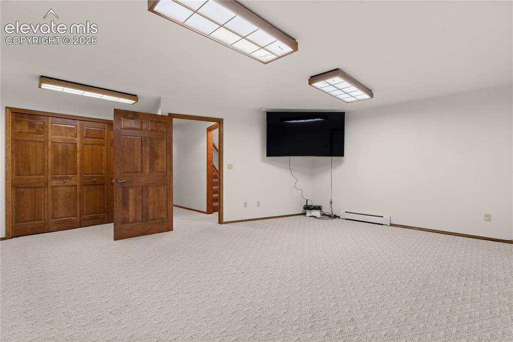 Image 25 of 30: There are several unfinished rooms in the basement - perfect for hobbies an