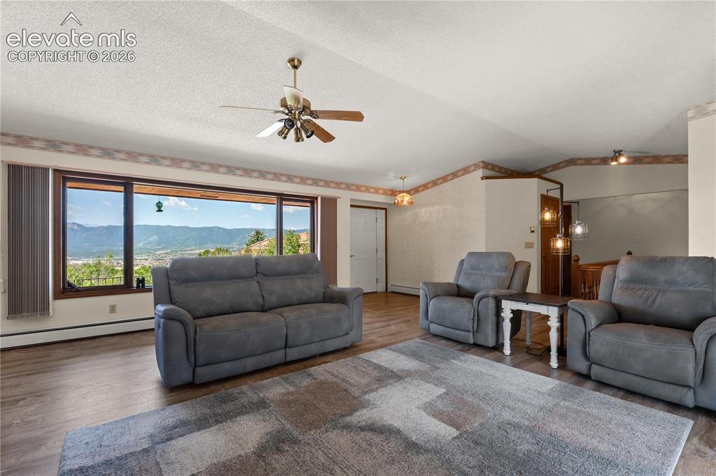 Image 8 of 30: This living room is spacious and bright.