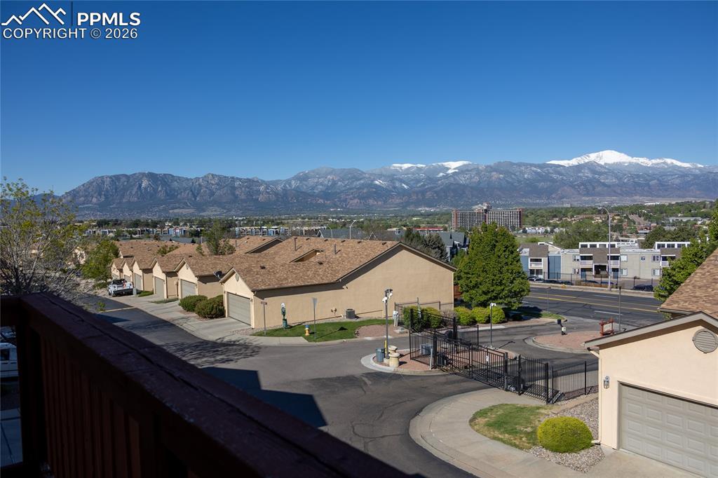 Image 22 of 25: Mountain backdrop featuring snow-capped peaks