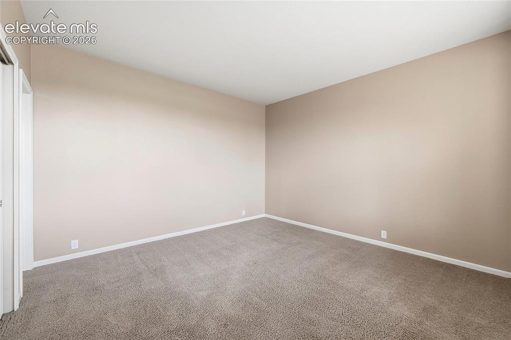 Image 14 of 50: Main Level Bedroom