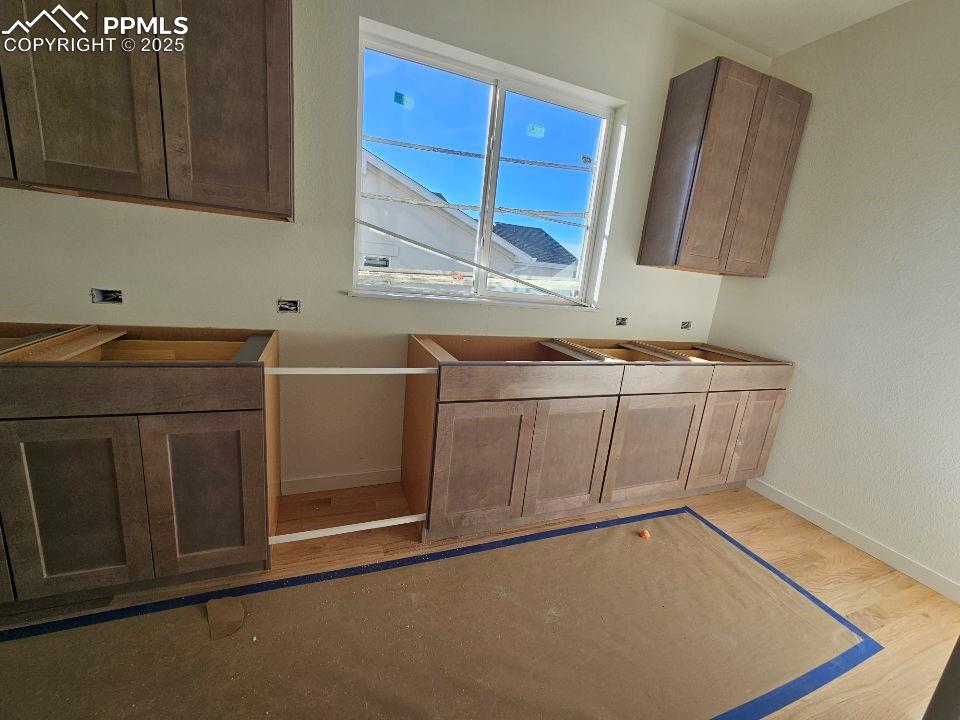 Image 19 of 25: Back Kitchen