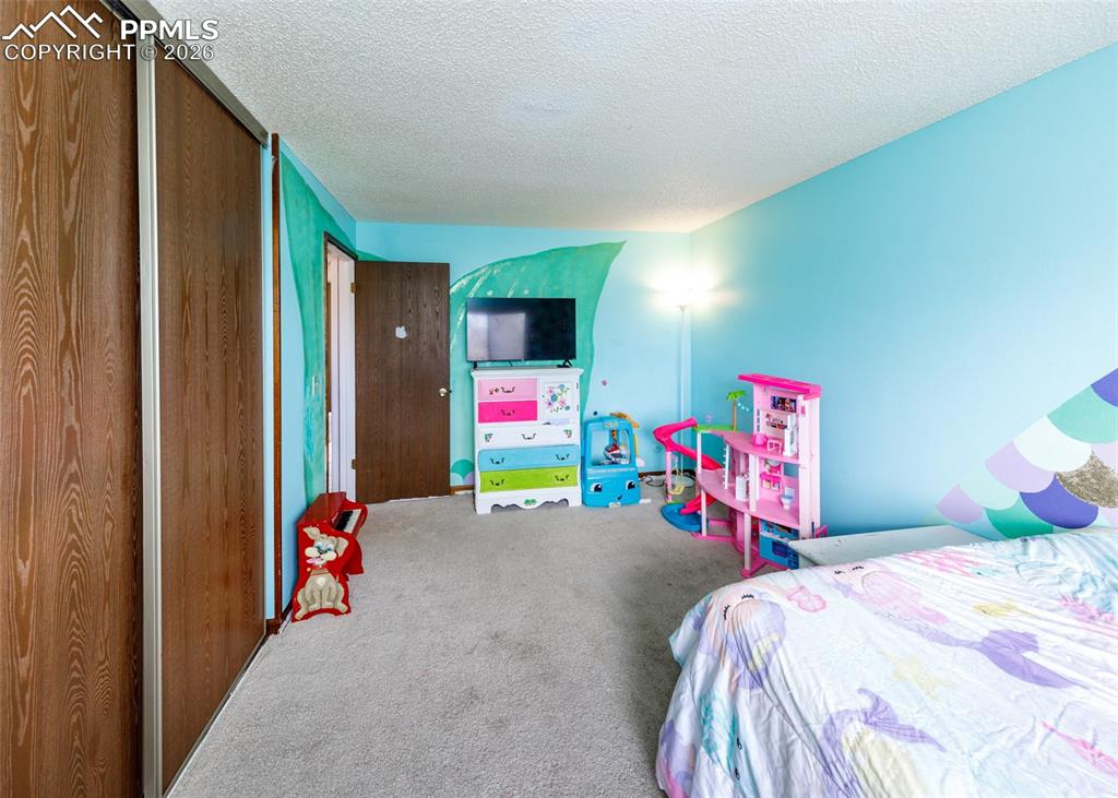 Image 12 of 31: Bedroom