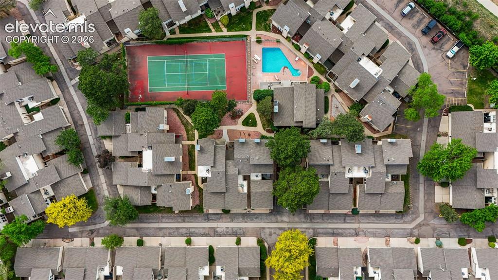Image 37 of 40: Community pool and tennis court
