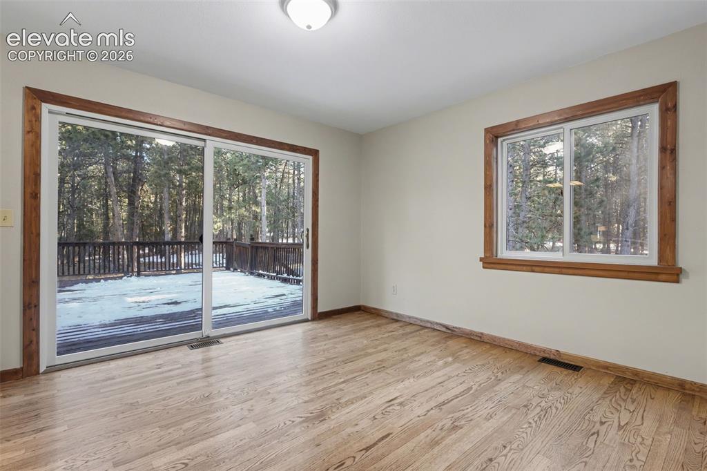 Image 11 of 50: Large patio door from the dining area