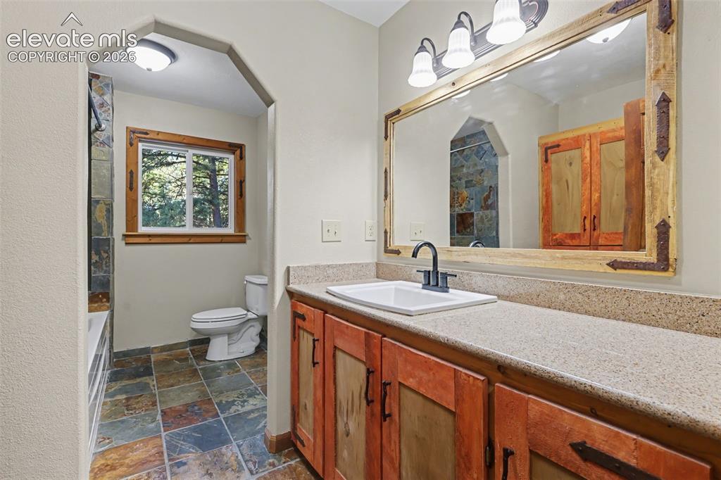 Image 16 of 50: Main level bathroom