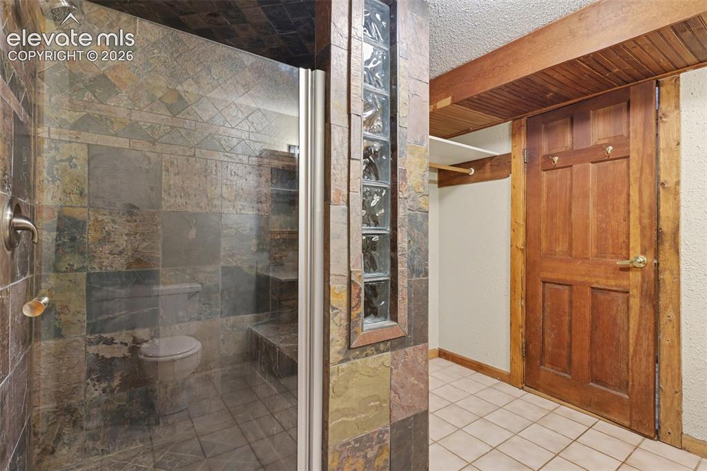 Image 31 of 50: Slate tile plus storage
