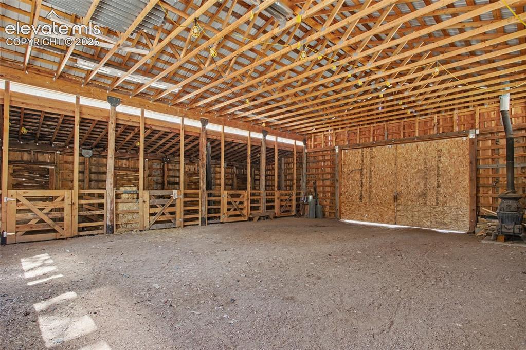 Image 49 of 50: Interior of the 4 stall horse barn
