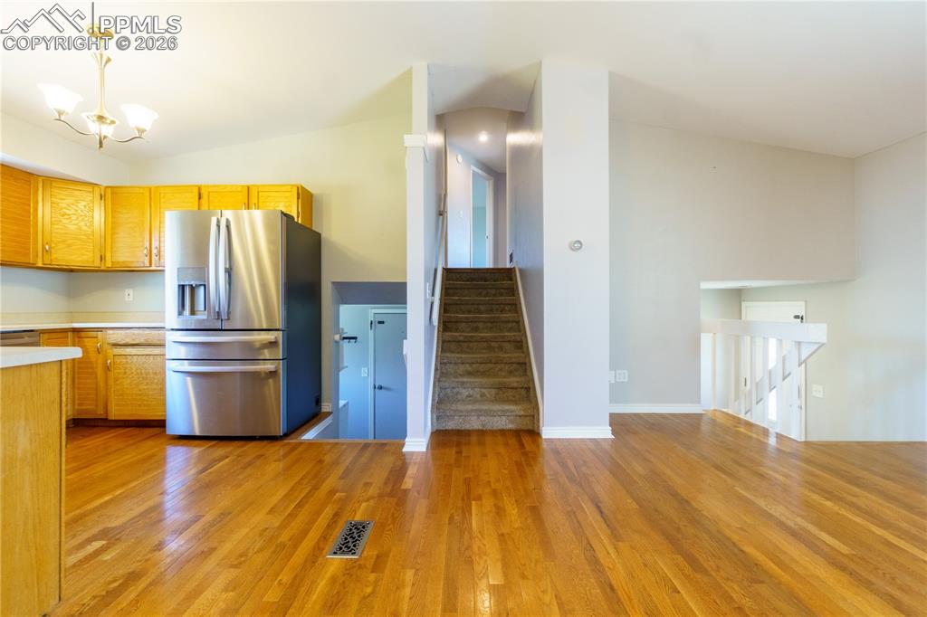 Image 12 of 25: Kitchen with stainless steel appliances