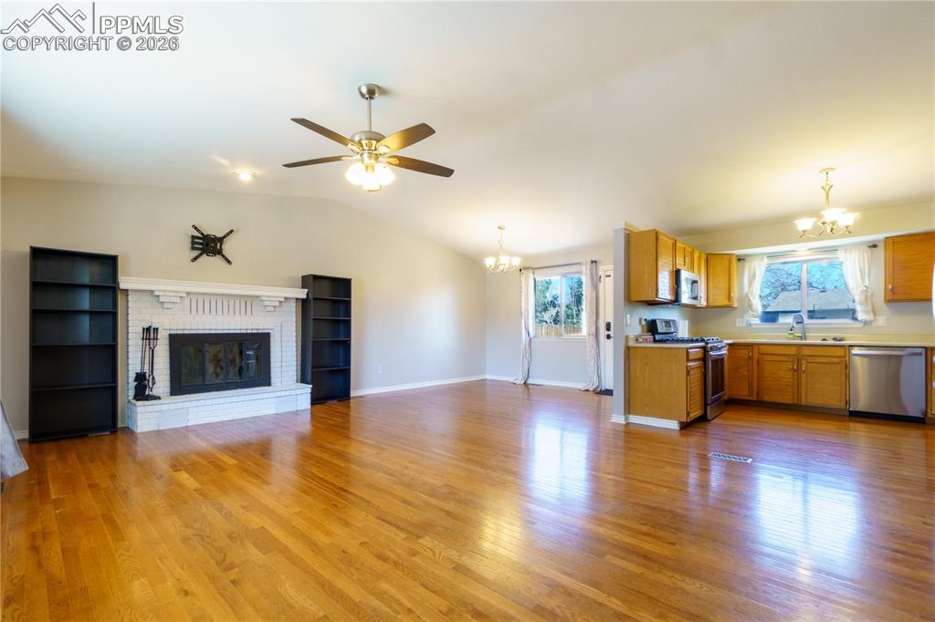 Image 2 of 25: Living room, and kitchen open floor plan