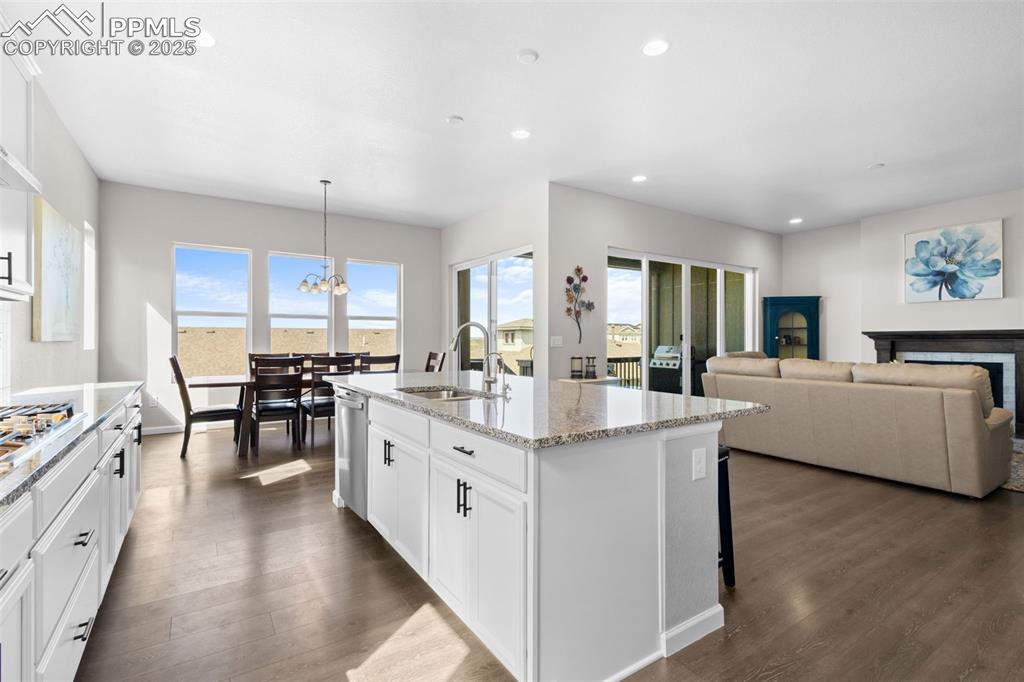 Image 11 of 47: Kitchen with plenty of natural light, a chandelier, recessed lighting, and 