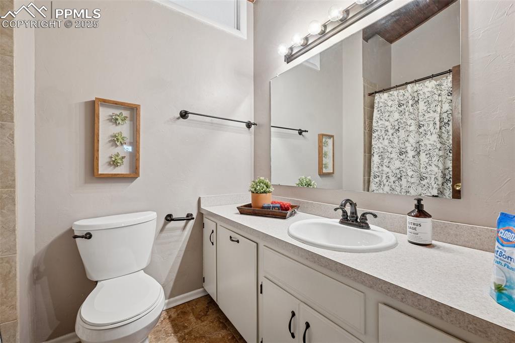 Image 31 of 34: Full bath featuring vanity and toilet