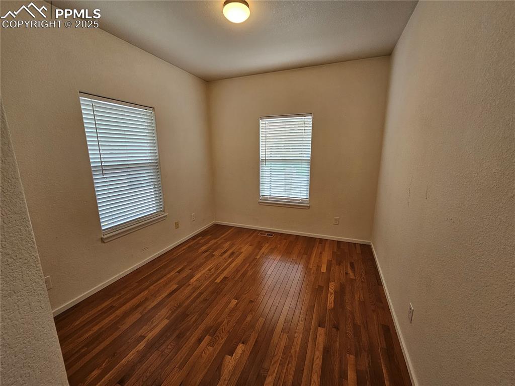 Image 29 of 42: main level secondary bedroom
