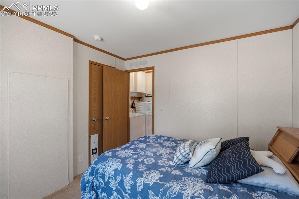 Image 9 of 15: Bedroom