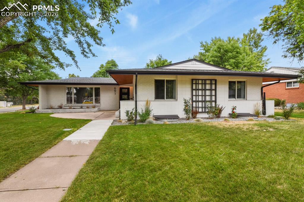 Image 1 of 48: Welcome home to Mid-century modern living