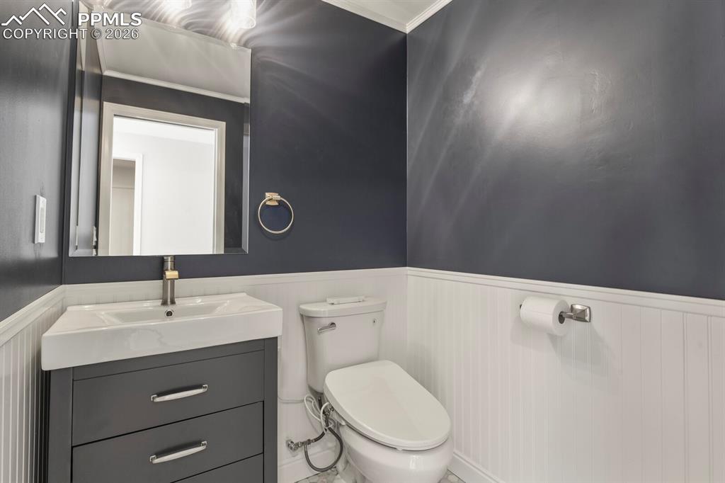 Image 27 of 48: Contemporary 1/2 bathroom on the main level perfect for guests