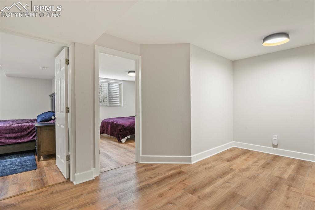 Image 36 of 48: Basement living area featuring LVP flooring